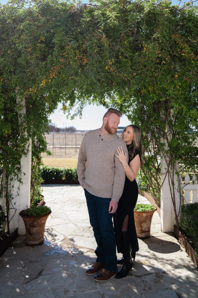 Austin engagement photography captures couple at romantic vineyard
