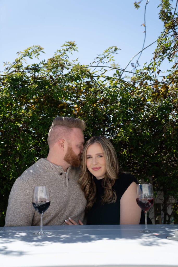
Couple walking through vineyard at sunset in Austin Texas
