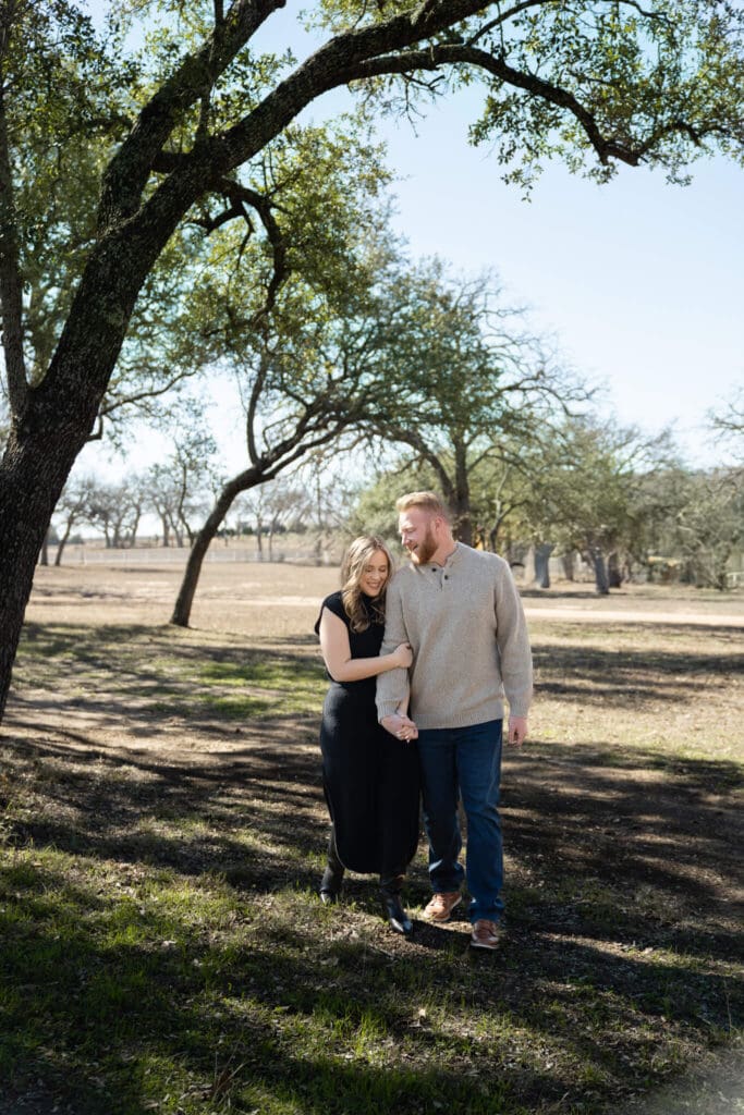 Editorial-style engagement portraits at Austin vineyard
