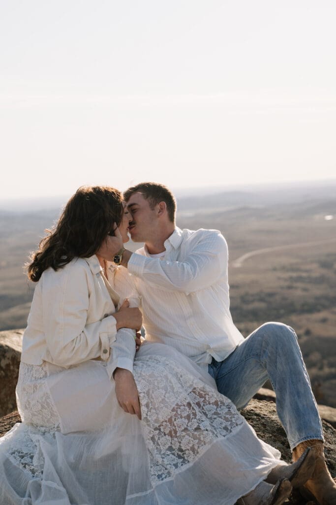 Bride-to-be laughing during destination engagement photos
