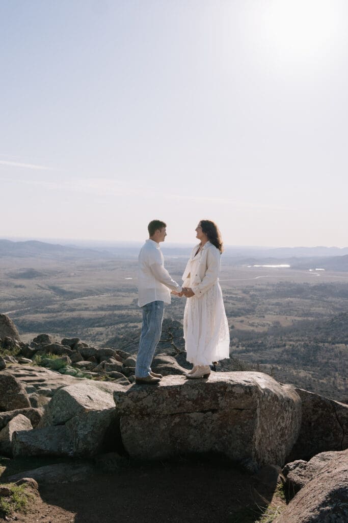 Couple dancing in the wind on top of Mt. Scott
