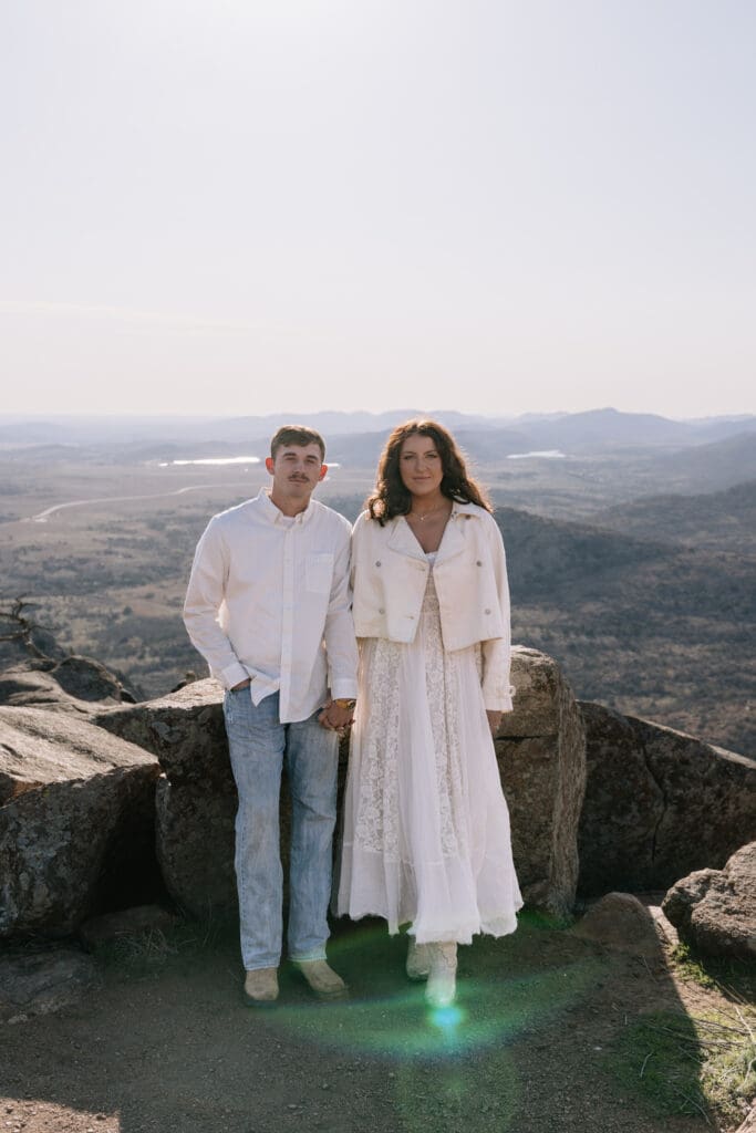 Intimate couple moment overlooking Oklahoma landscape
