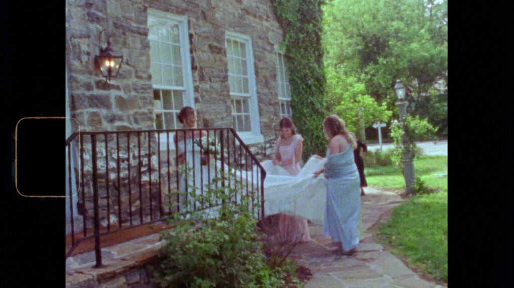 Romantic Super 8 film still capturing a couple in motion at golden hour, with soft grain and nostalgic warmth.