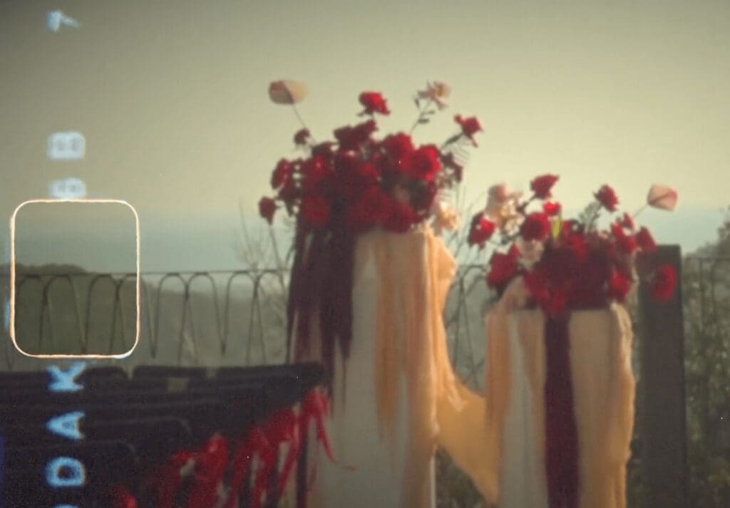 Bride and groom walking at Villa Antonia captured on Super 8 film