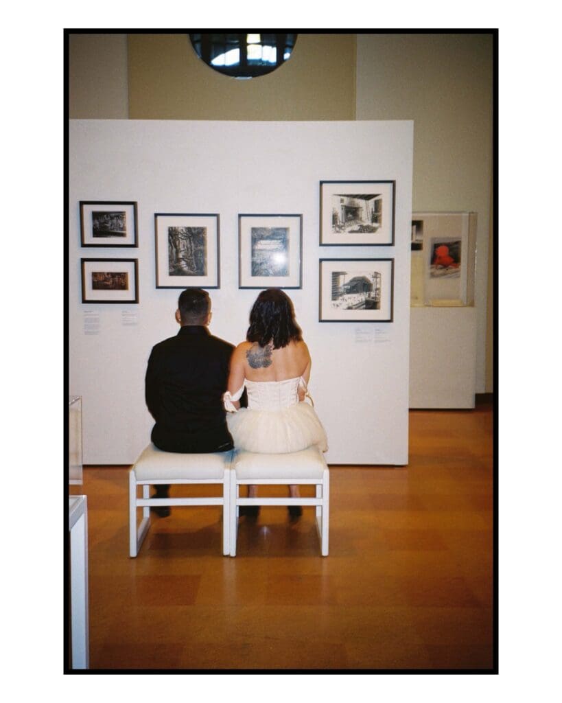 Couple laughing during engagement session at Julia Ideson Library Houston
