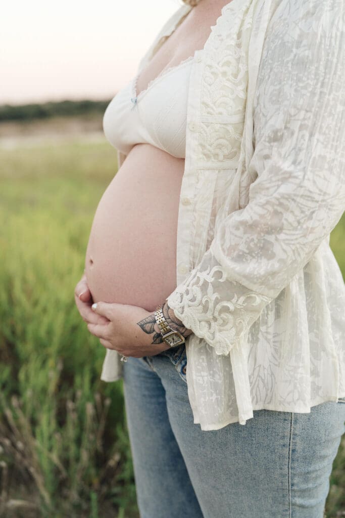 Sunset maternity portraits captured outdoors in Austin, Texas