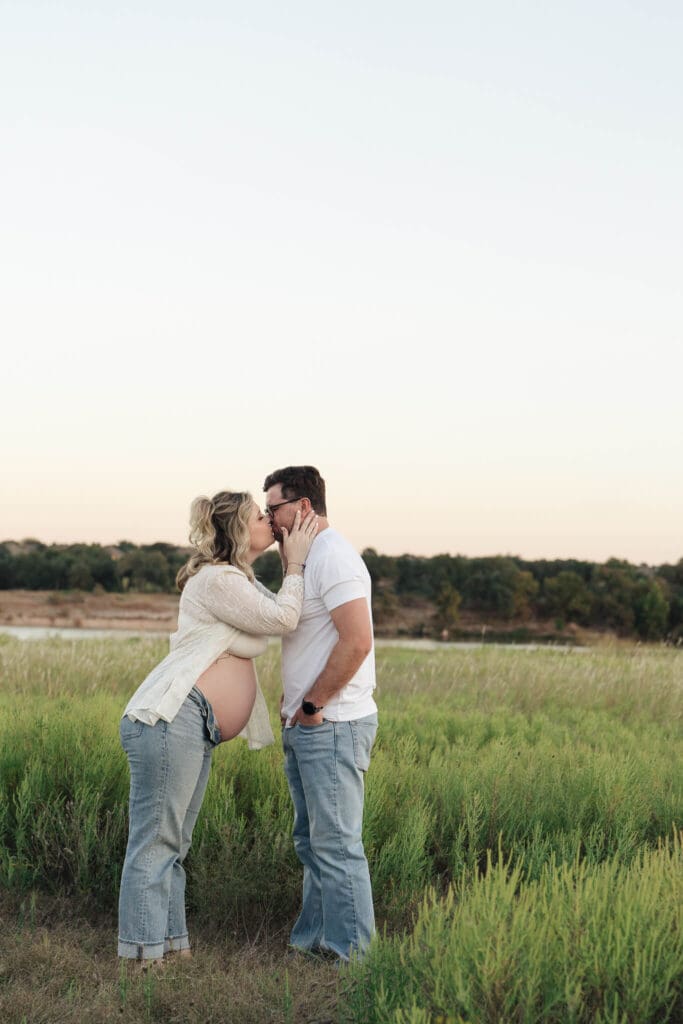 Expecting mother wearing a flowing dress during an Austin maternity session