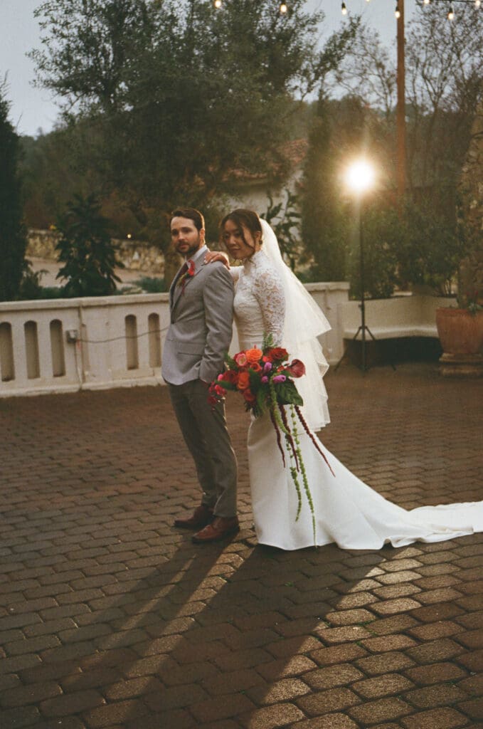 Night portraits captured at an Austin winter wedding venue