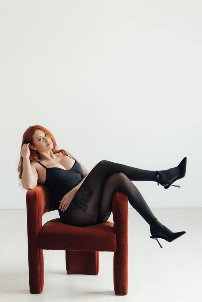 Woman posing during a portrait session in Baltimore studio