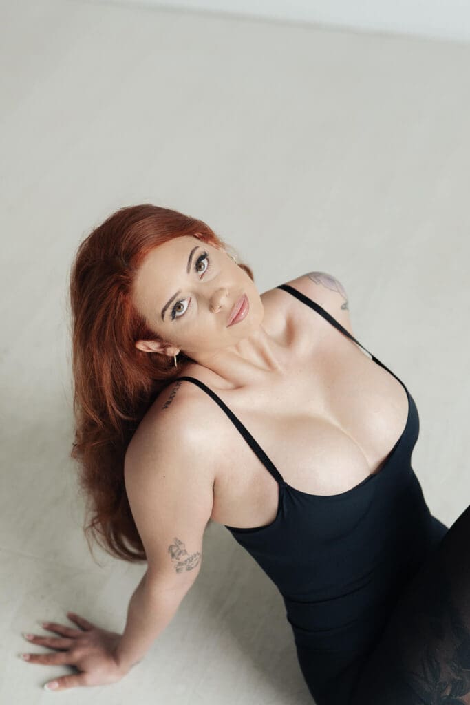 Soft light boudoir session highlighting natural beauty