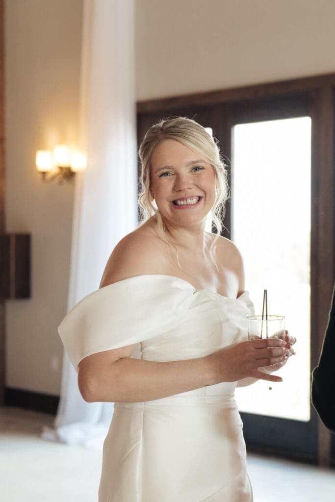Newlyweds sharing their first kiss at ceremony
