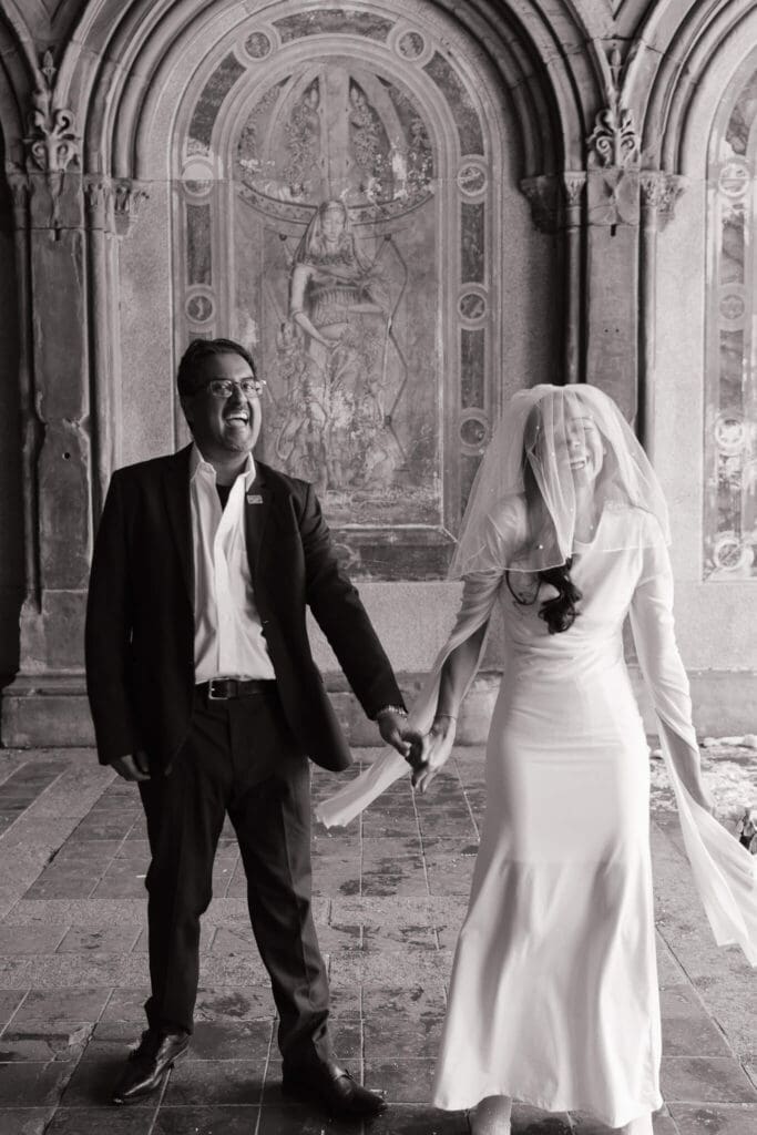 Groom smiling during first look moment