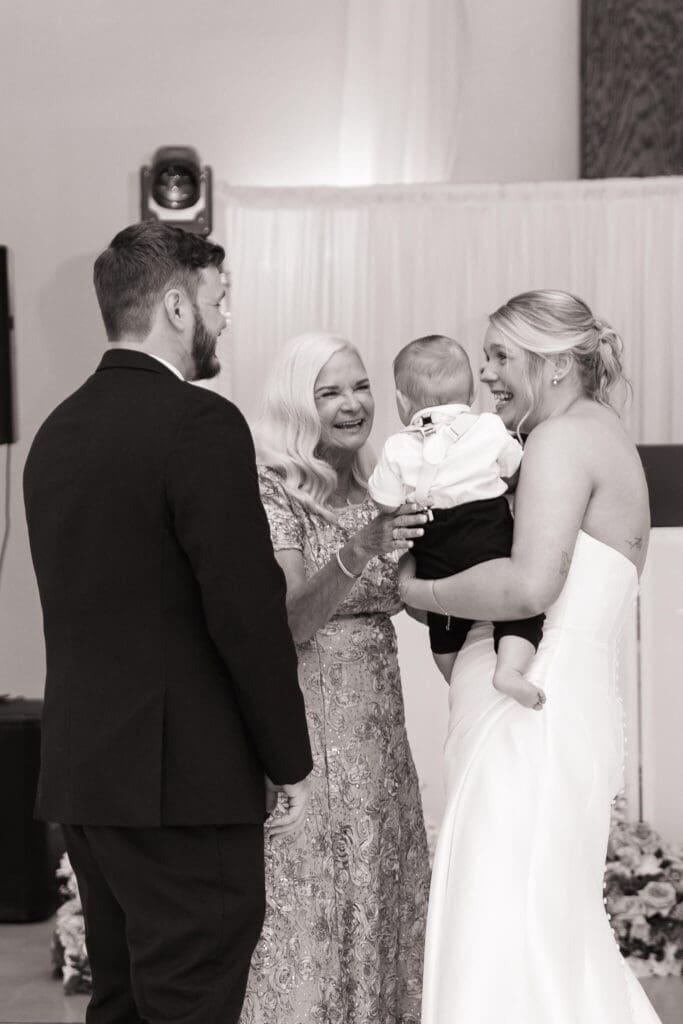 Couple sharing first dance under soft lighting
