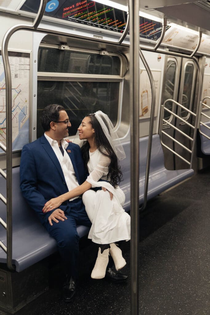 Nighttime portrait of couple in subway station