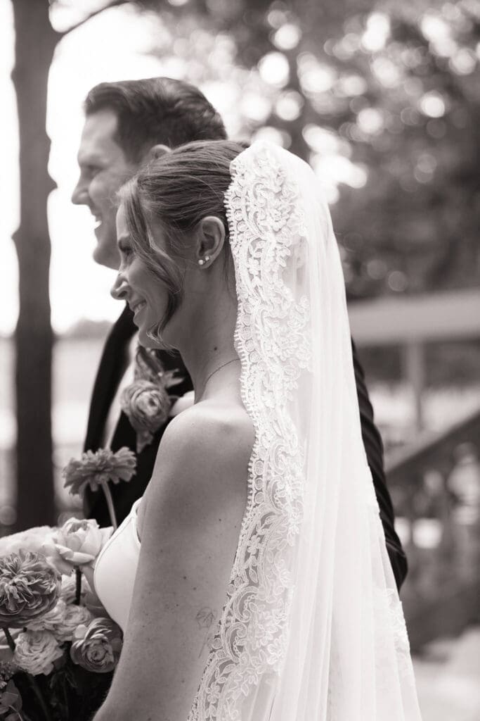 Couple celebrating after breaking the glass at Jewish wedding