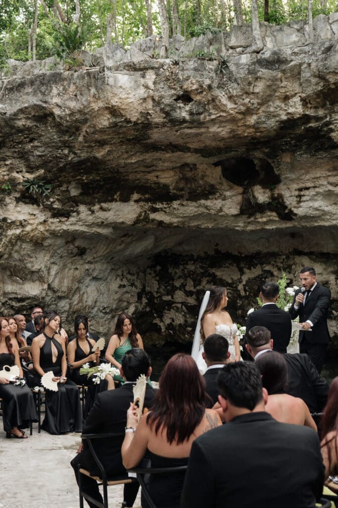 Luxury wedding aisle inside Cancun cenote ceremony
