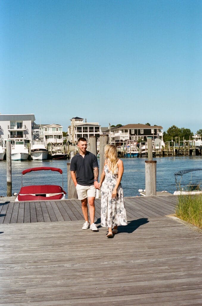 East Coast engagement photographer capturing candid waterfront portraits