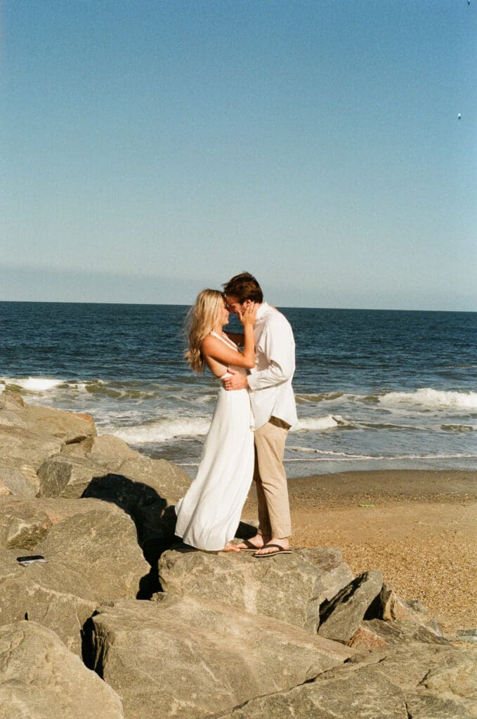 Candid couple moment captured naturally during a summer session in Lewes Delaware