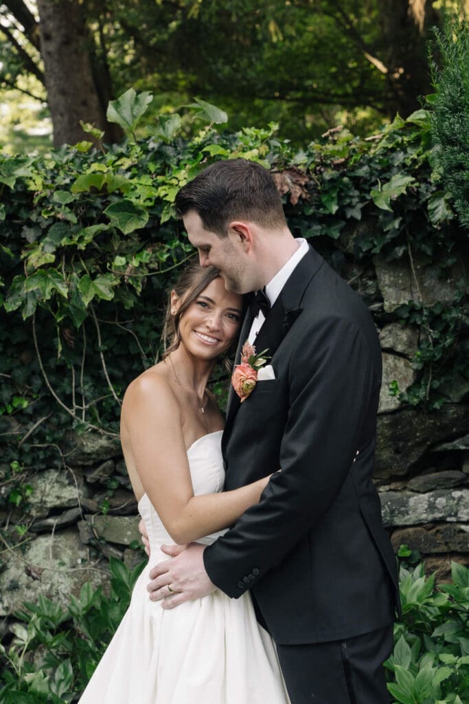 Romantic estate wedding portraits with soft evening light
