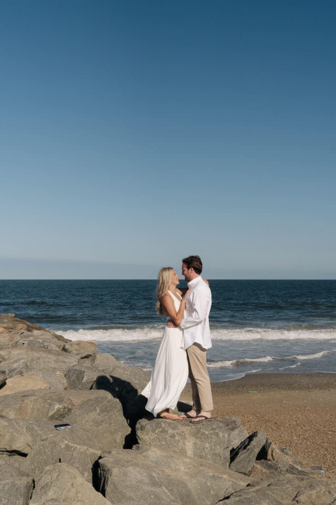 Lewes Delaware engagement photos captured on the beach during golden hour