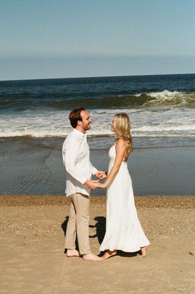 Lewes Delaware engagement photos near coastal dunes and beach grass