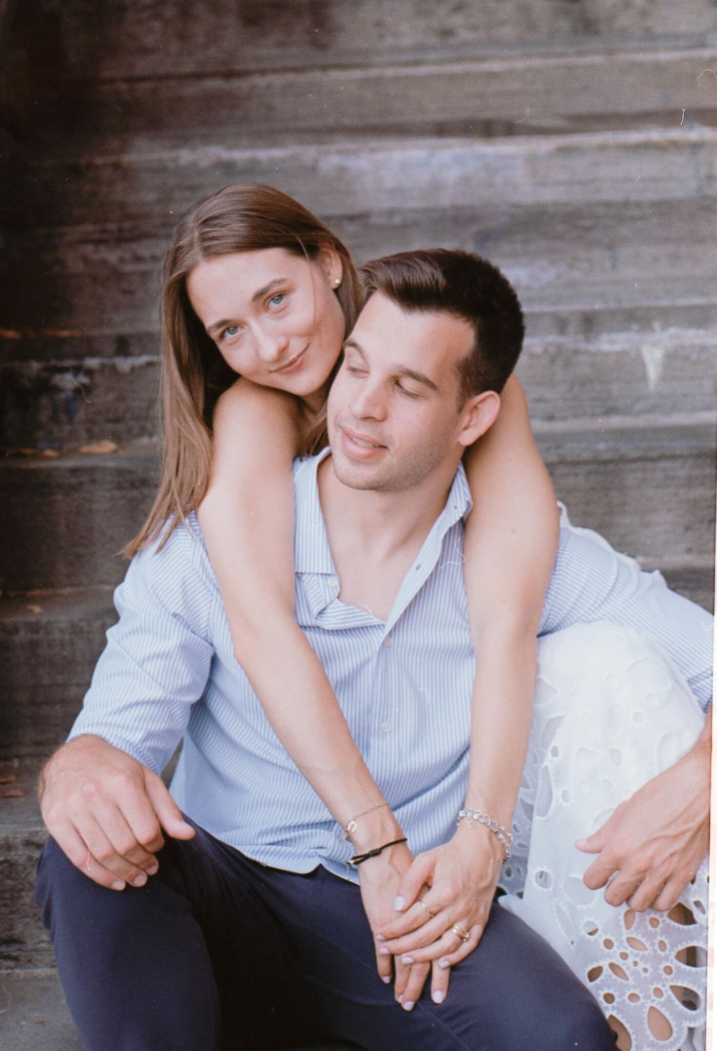 Whimsical 35mm film engagement session with editorial inspired posing