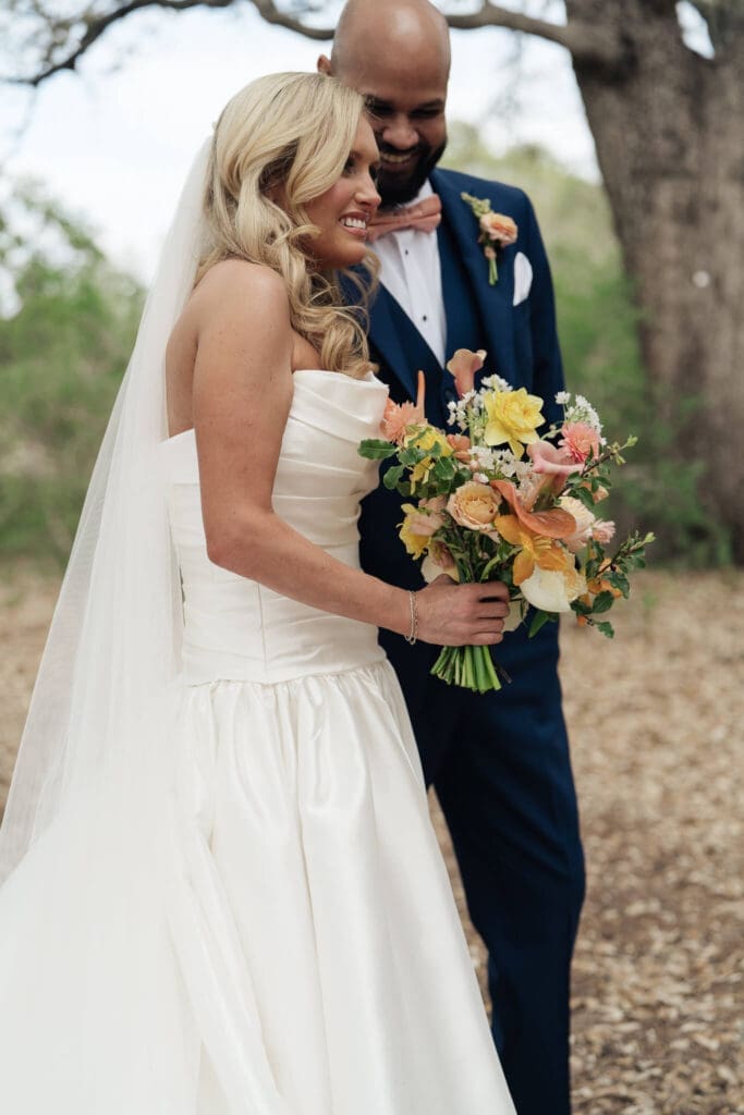 Romantic wedding portraits surrounded by seasonal blooms at Lady Bird Wildflower Center