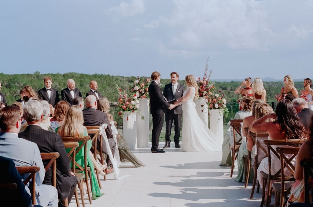 Wide view of a Videre Estate wedding ceremony in Dripping Springs