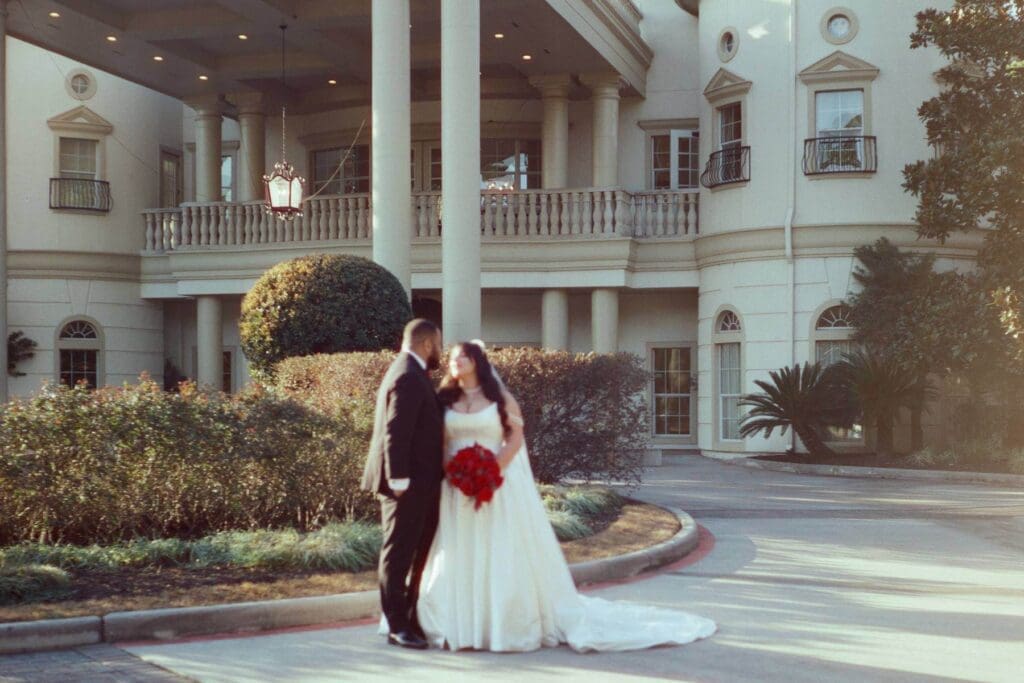 Couple exchanging vows during an outdoor wedding ceremony