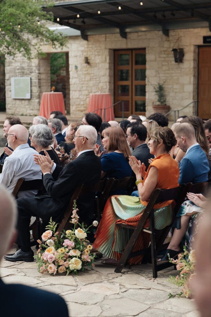 Floral arch showcasing spring wedding floral inspiration with bold seasonal blooms