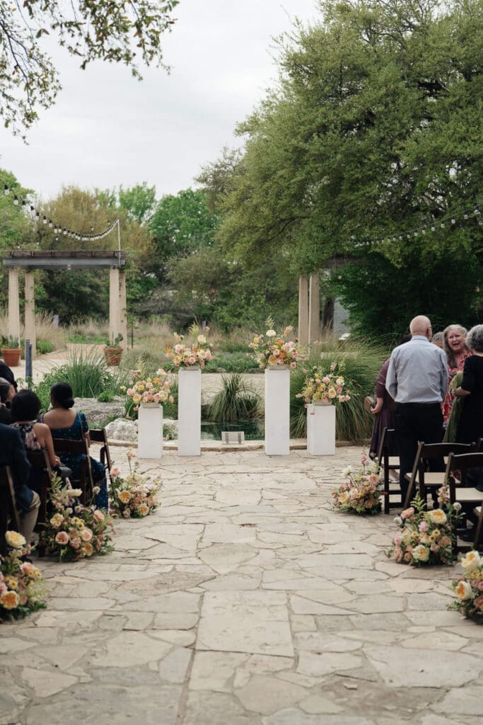  Modern editorial wedding portraits among blooming spring flowers