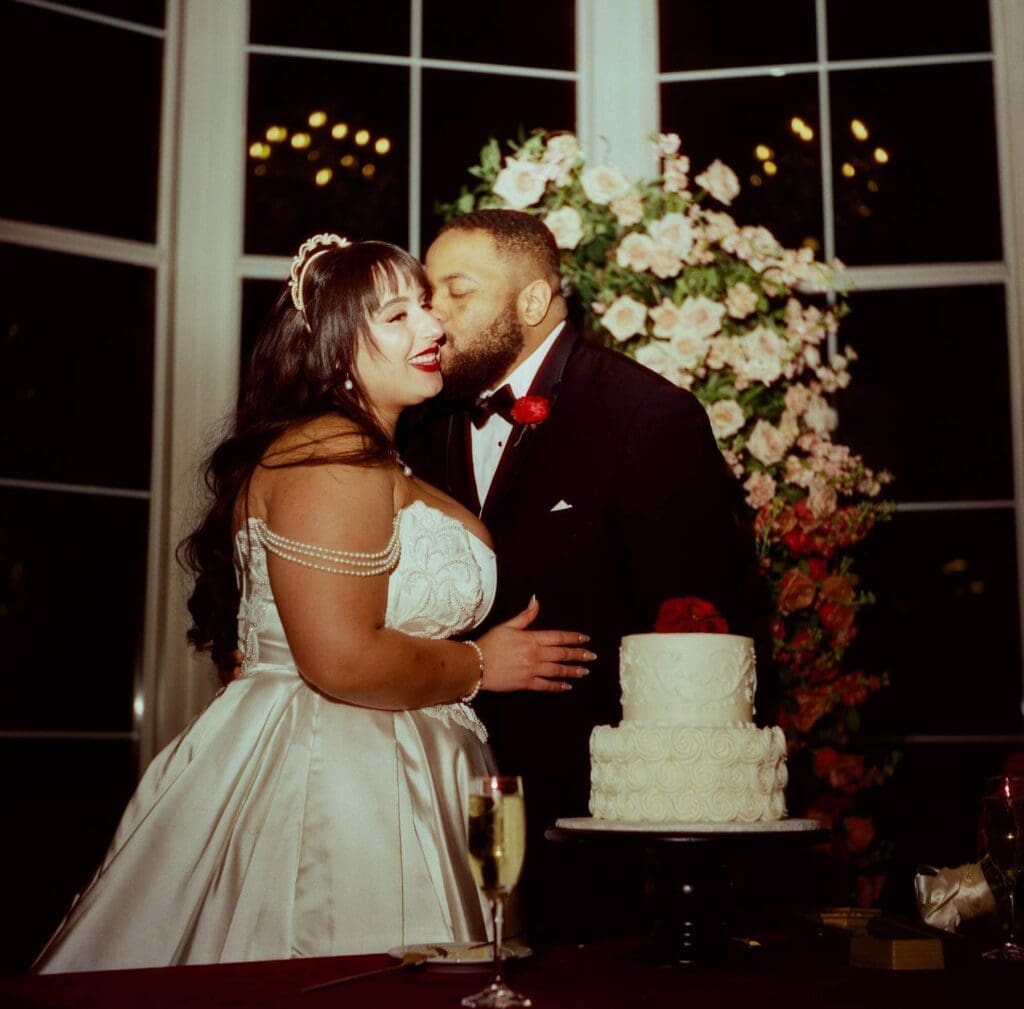 Candlelit reception table design documented through film wedding photography